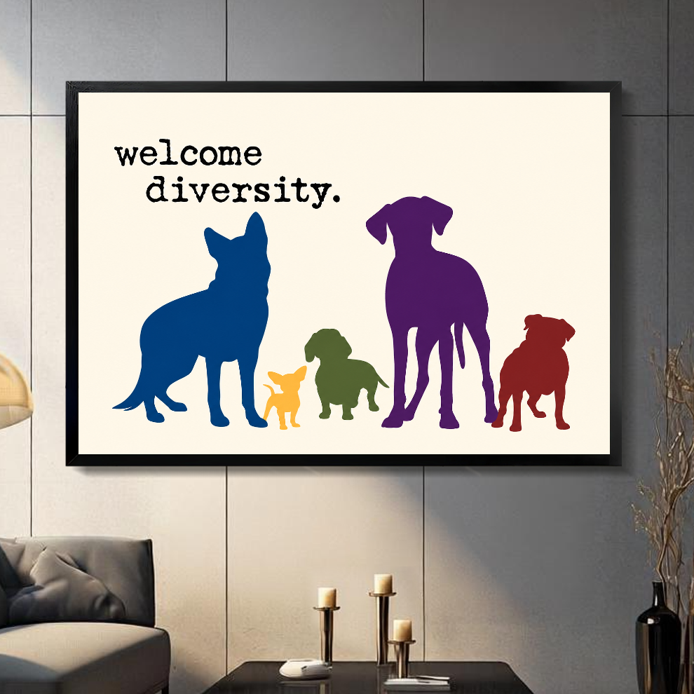 Black framed colorful welcome diversity dogs canvas artwork displayed on a gray wall in a neutral room.