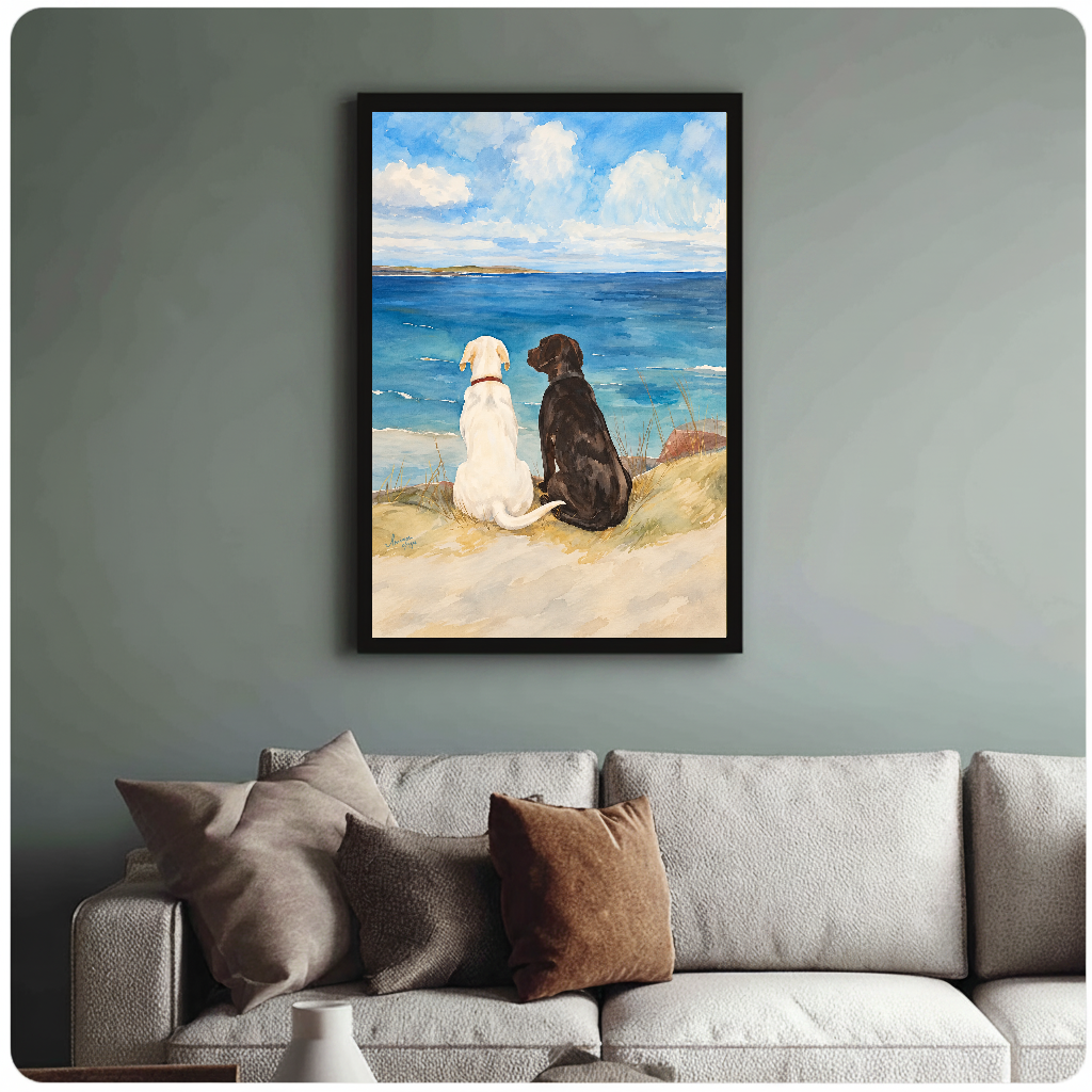 Framed seaside dogs wall artwork displayed above a neutral sofa with soft cushions.