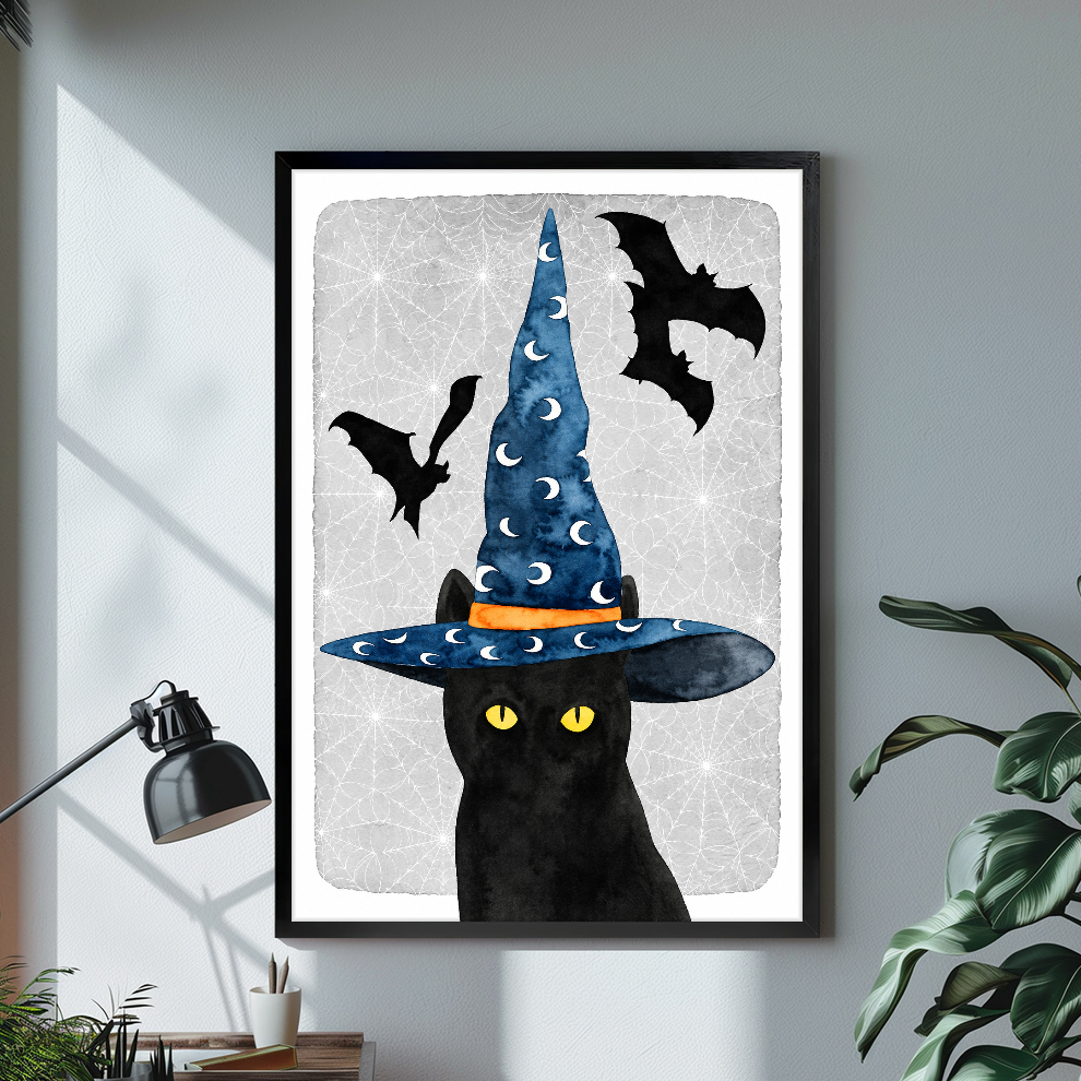 Black framed witch cat canvas artwork displayed in a neutral interior with visible frame depth.