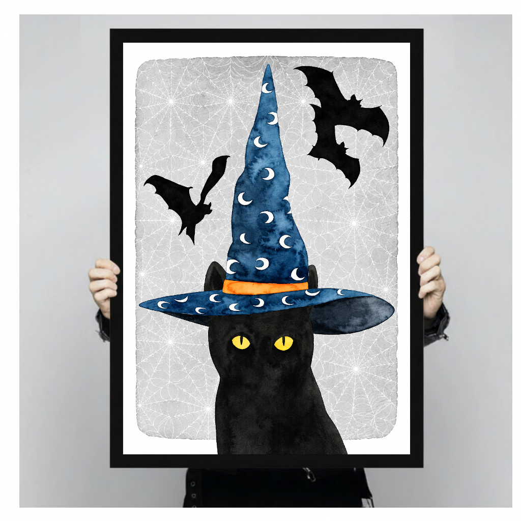 A person holds framed witch cat canvas artwork to demonstrate its portrait proportions.