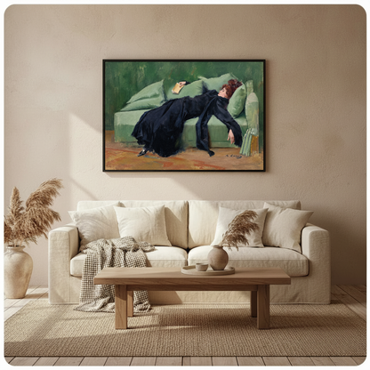 Framed reading woman wall artwork displayed above a neutral sofa in a softly styled room.