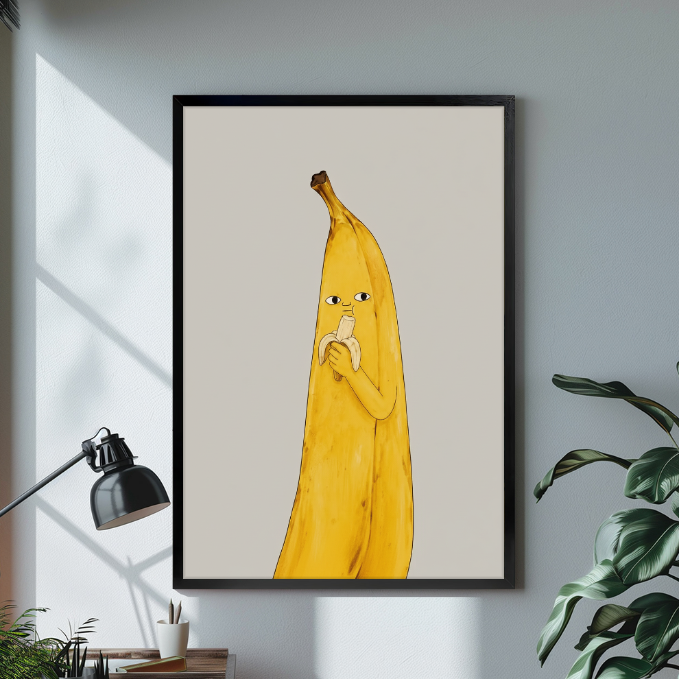Black framed banana character canvas artwork displayed in a neutral interior with visible frame depth.