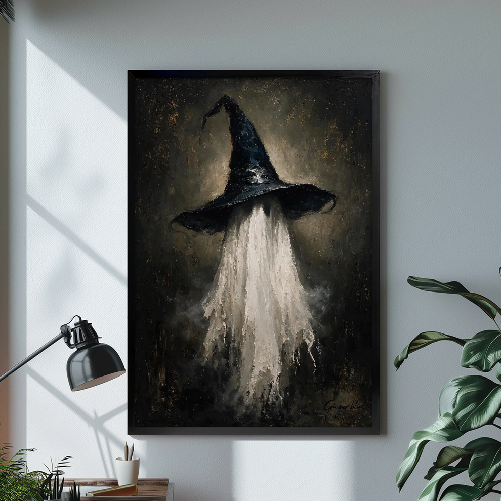 Black framed witch hat ghost canvas artwork displayed in a neutral interior with visible frame depth.