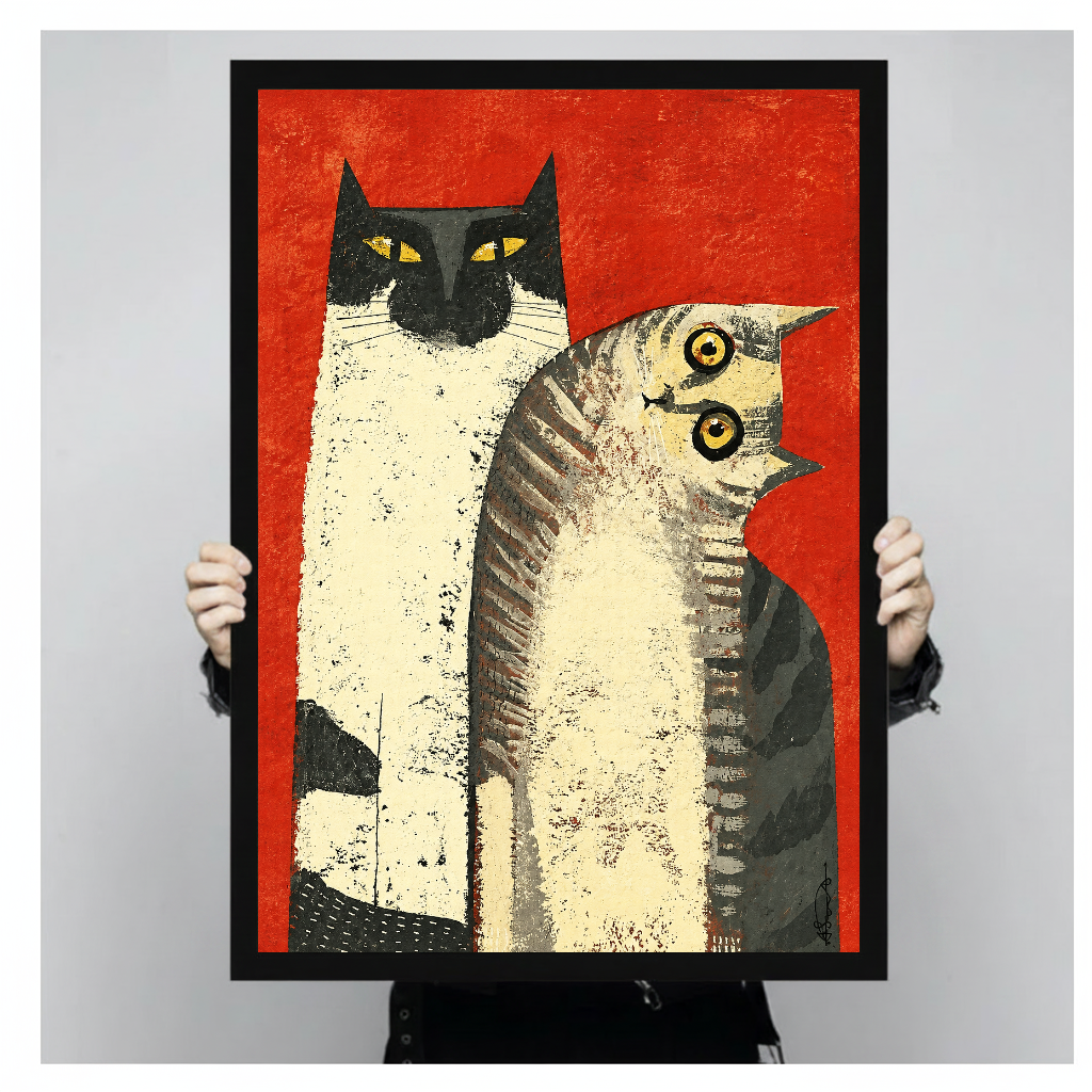 A person holds framed folk cats canvas artwork to demonstrate its portrait proportions.