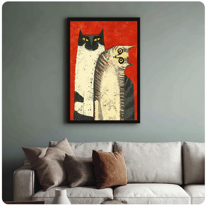 Framed folk cats wall artwork displayed above a neutral sofa with soft cushions.