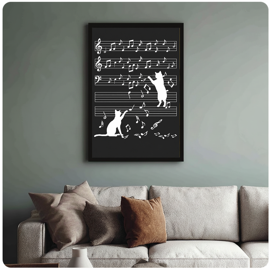 Framed white cat silhouettes and falling music notes displayed above a sofa.