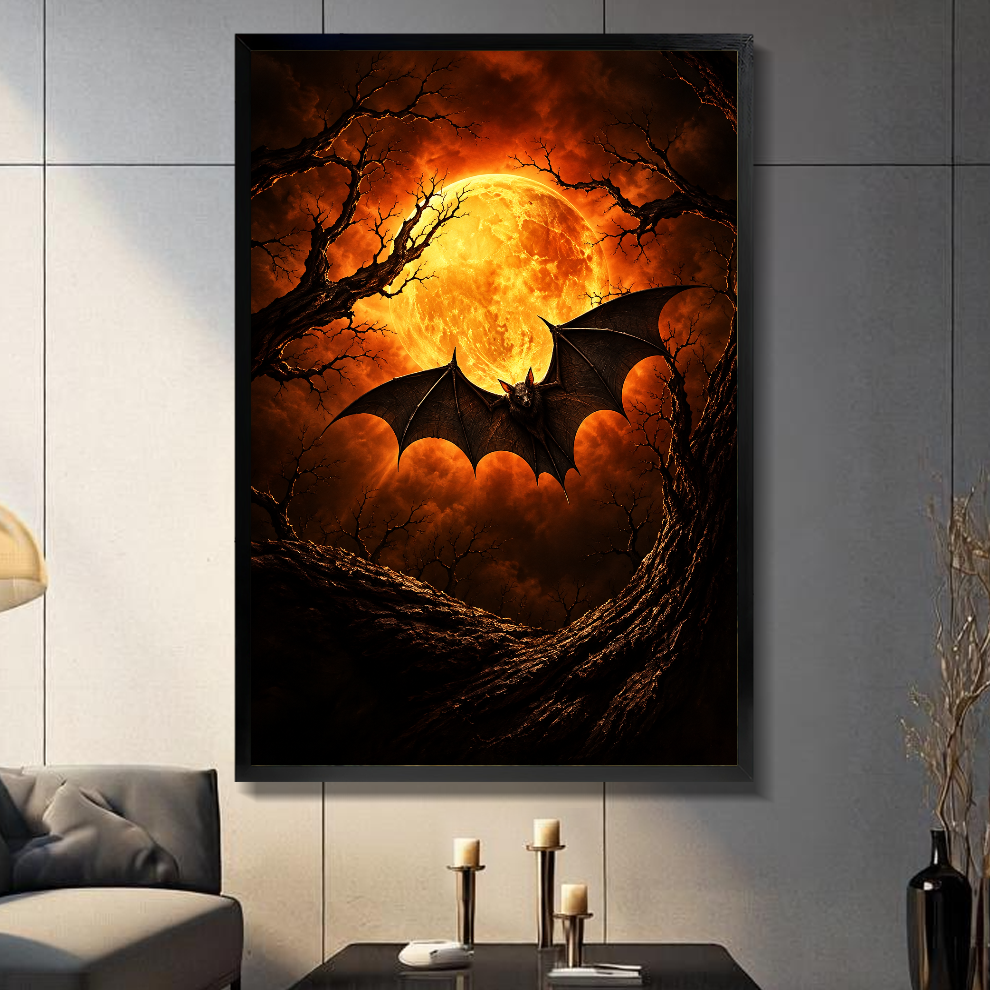 Black framed canvas showing amber moon and flying bat on a gray paneled wall with candles.