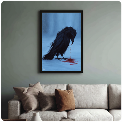 Framed blue grieving raven painting above a sofa with muted cushions against a green-gray wall.