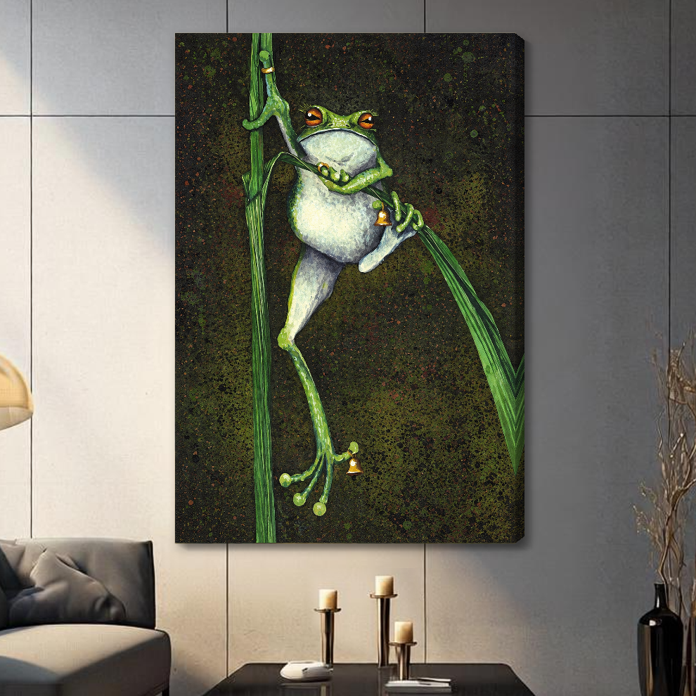 Stretched canvas depicting a frog holding bells among reeds displayed on a gray paneled wall with candles.