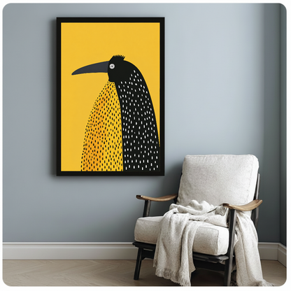 Framed artwork of a spotted black bird on yellow beside a pale reading chair against a gray wall.