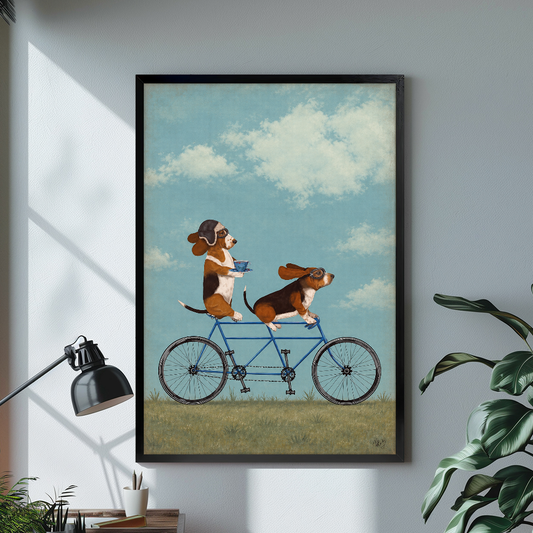 Black framed tandem bicycle beagles canvas above a desk with lamp and green plant.