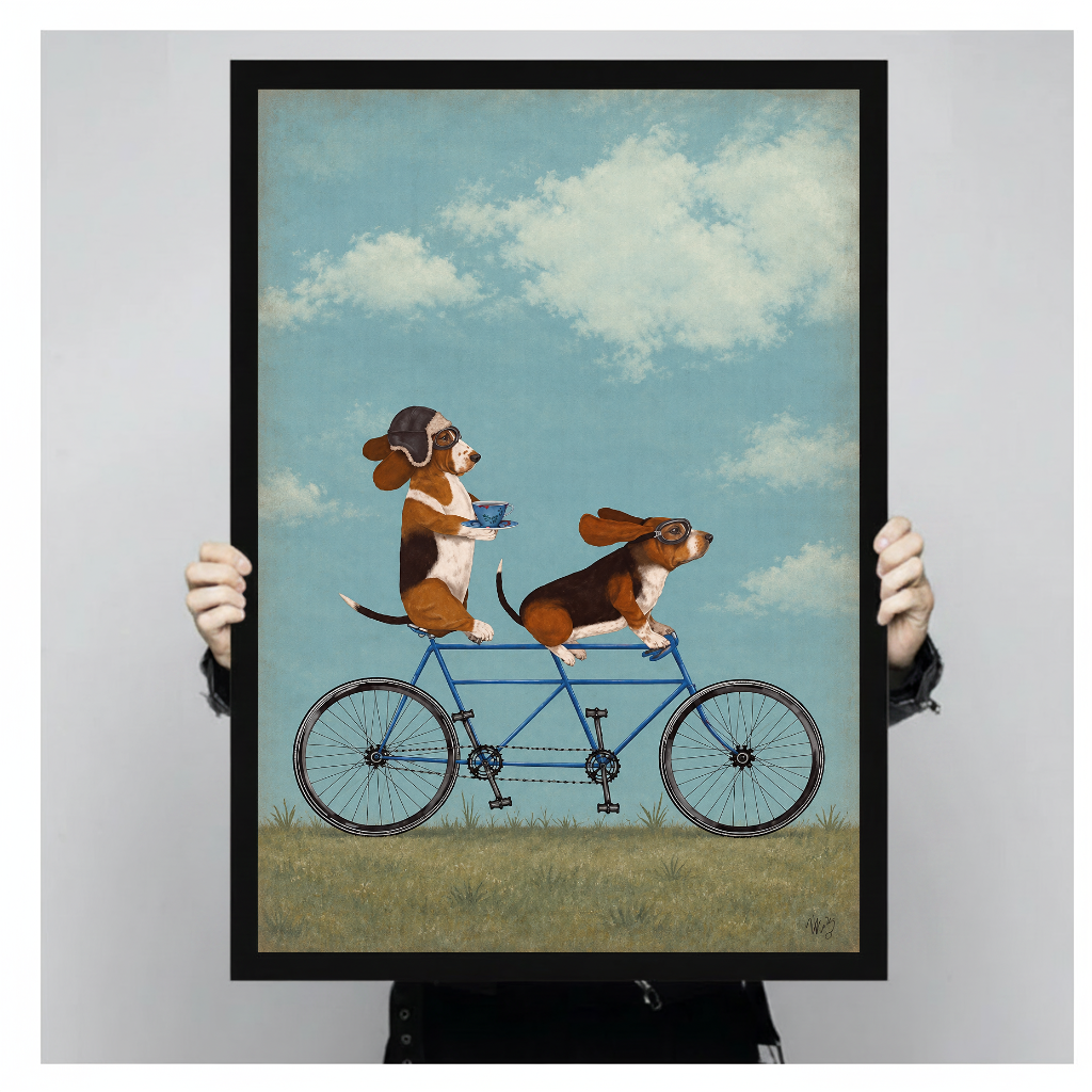 Person holding black framed tandem bicycle beagles artwork against a plain pale background.