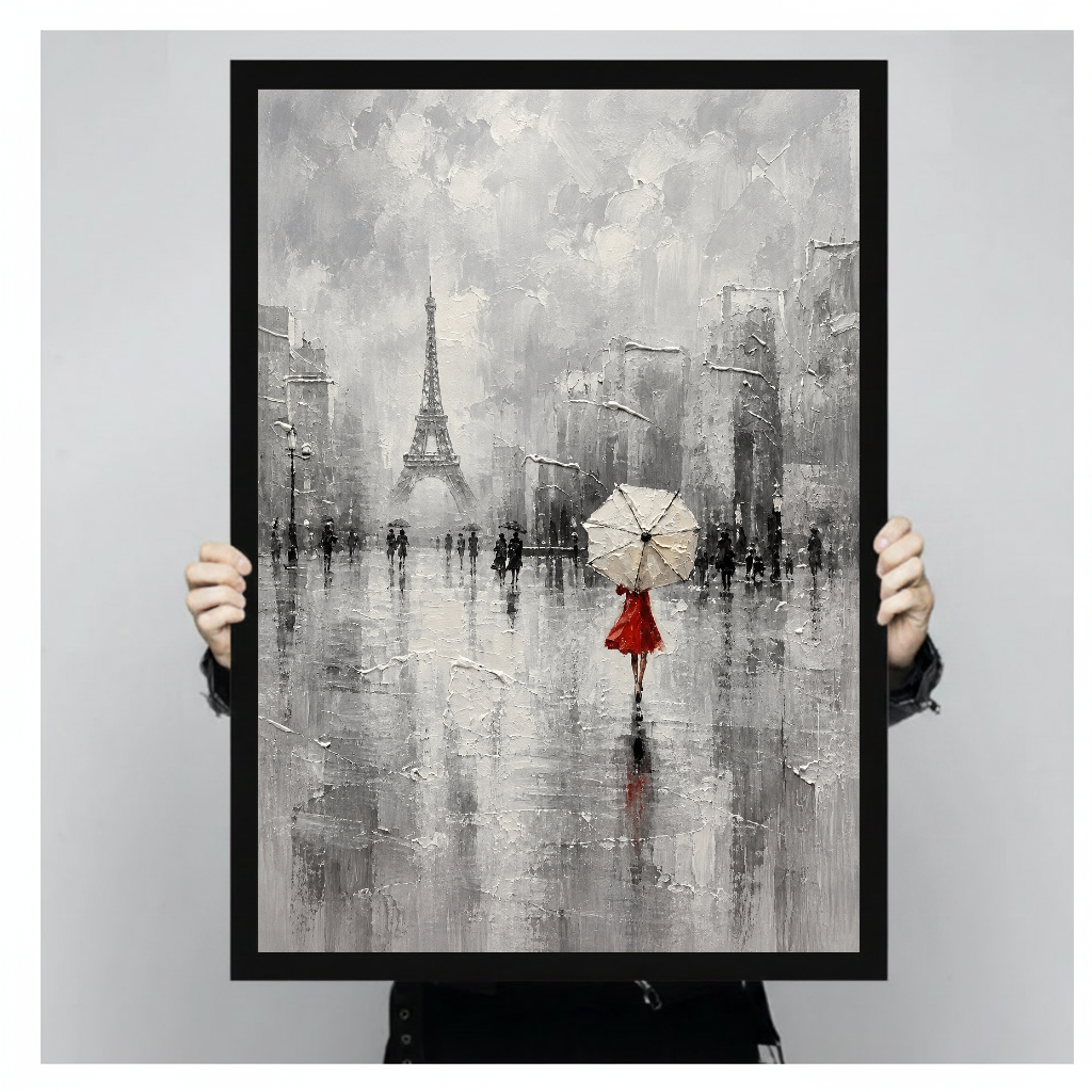 Framed artwork of a red dressed woman beneath an umbrella held by a person against a pale backdrop.