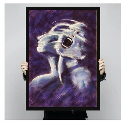 Framed artwork of an expressive white ghost on purple held by a person against a pale backdrop.
