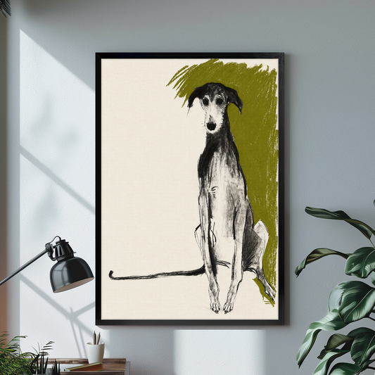Black framed canvas depicting a charcoal greyhound with olive brushwork on a bright desk with a lamp.