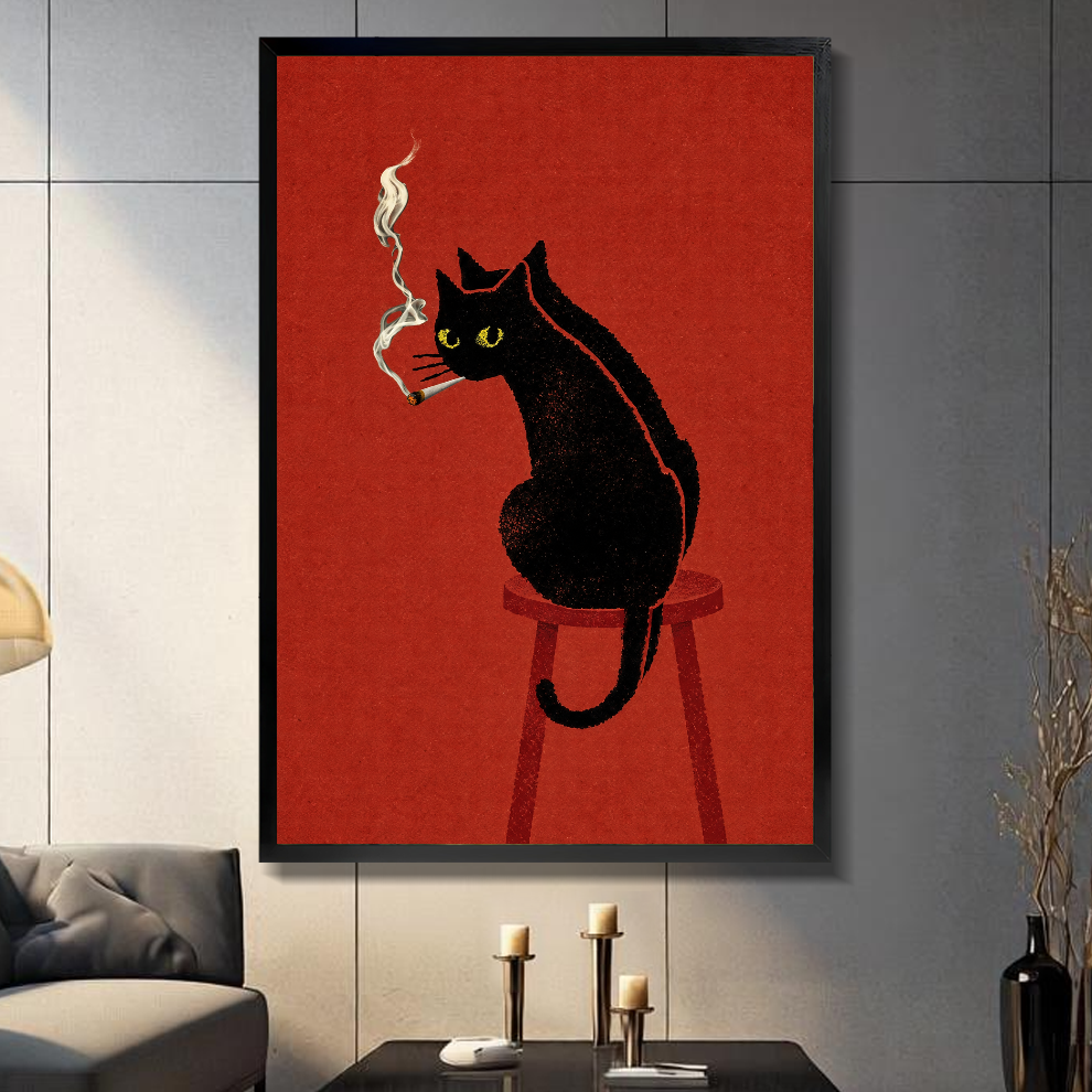 Black framed smoking black cat canvas above a console beside a sofa in a paneled room.