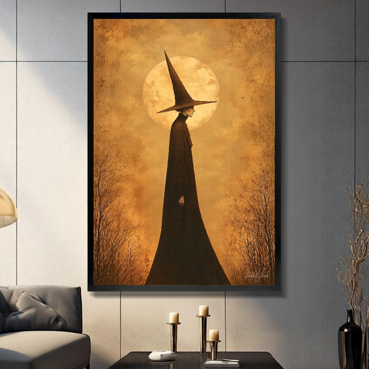 Black framed golden moon witch canvas above a console beside a sofa in a paneled room.
