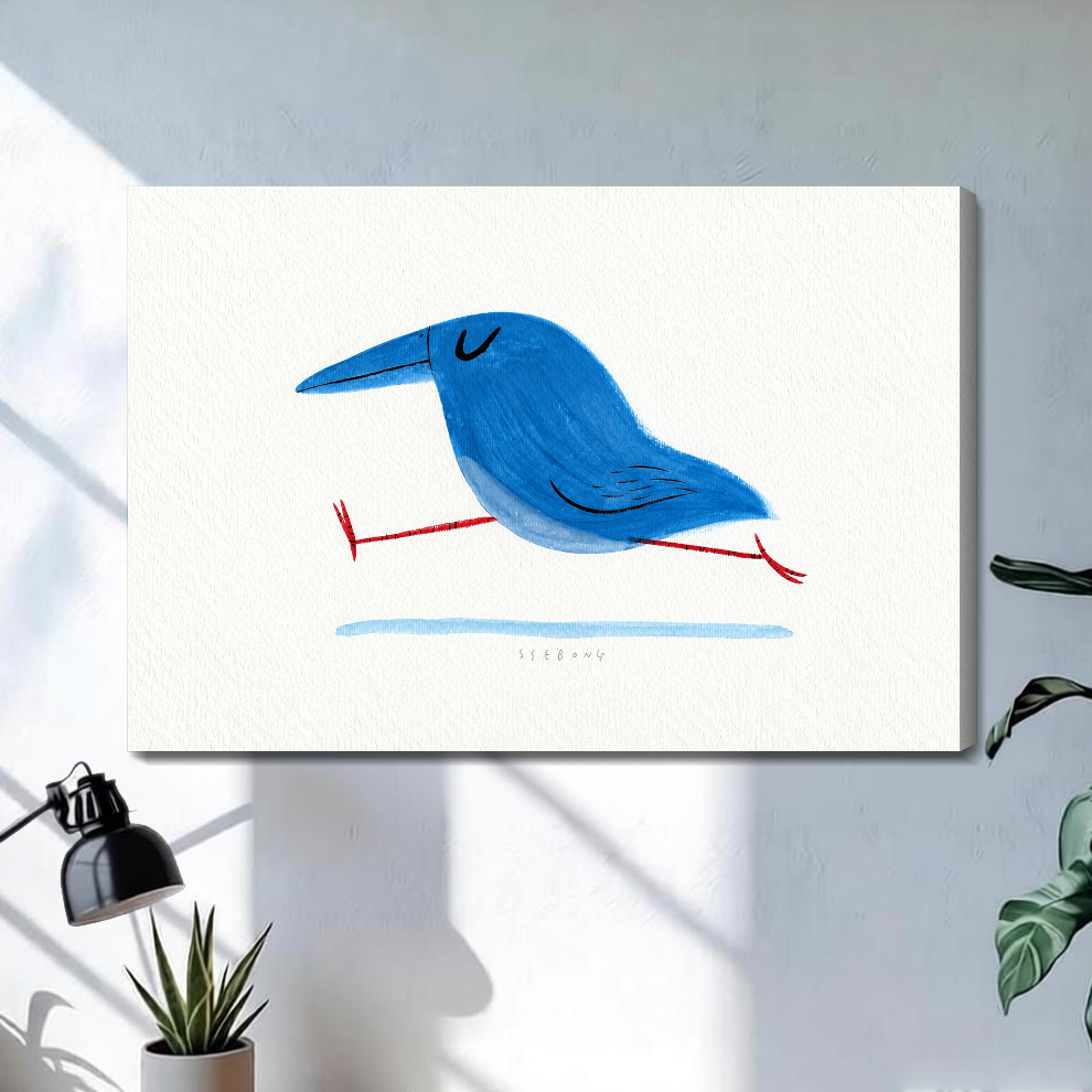 Stretched running blue bird canvas above a light desk, showing a shaded wrapped side edge.