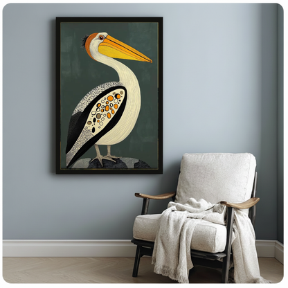 Framed artwork of a patterned pelican with a golden bill beside a pale reading chair against a gray wall.