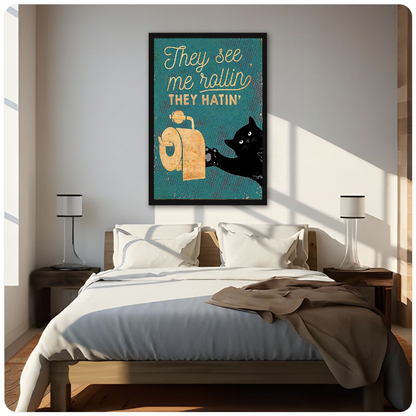 Teal toilet paper cat canvas above a neutral bed with bedside lamps and soft window light.