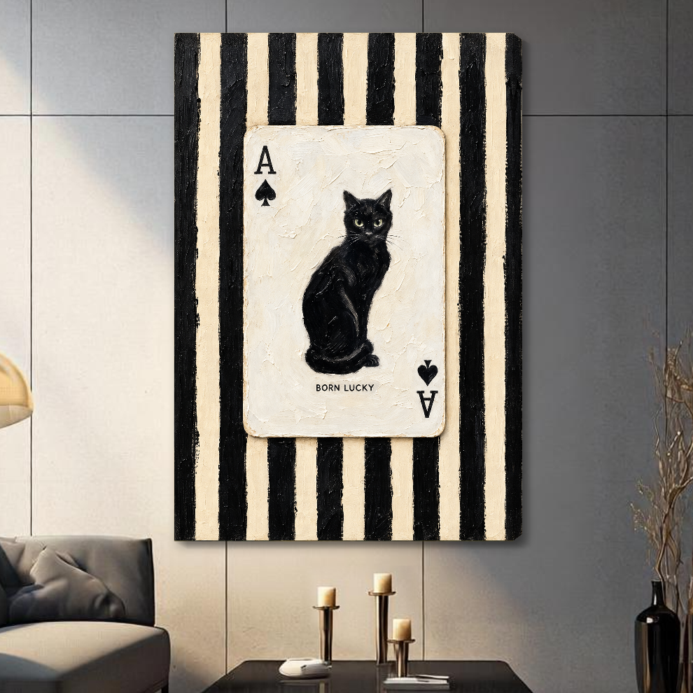 Stretched canvas depicting a black cat inside an ace playing card displayed on a gray paneled wall with candles.