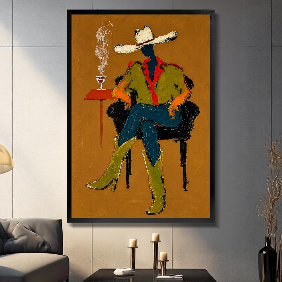 Black framed seated western cowboy canvas above a console beside a sofa in a paneled room.