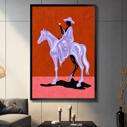 Black framed lavender horseback rider canvas above a console beside a sofa in a paneled room.