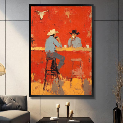 Black framed cowboys at bar canvas above a console beside a sofa in a paneled room.