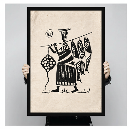 Framed artwork of a fisherman carrying four fish on a pole held by a person against a pale backdrop.
