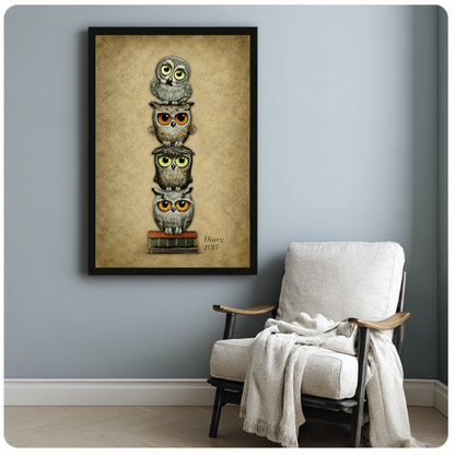 Framed stacked bookish owls artwork beside a pale reading chair against a blue-gray wall.