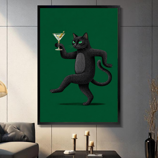 Black framed dancing black martini cat canvas on a dark paneled wall beside warm candles.