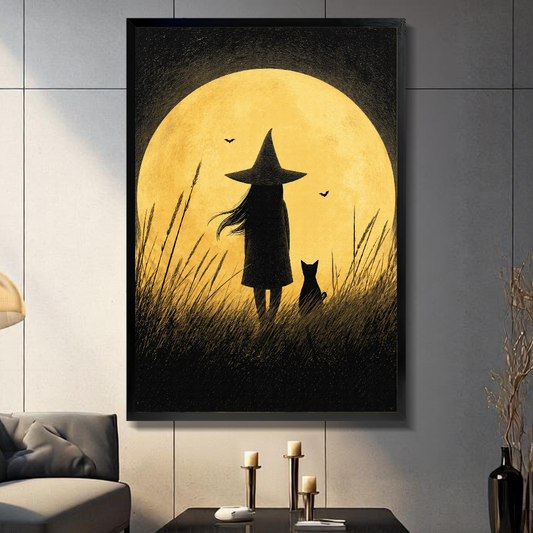 Black framed moonlit witch and cat canvas above a console beside a sofa in a paneled room.