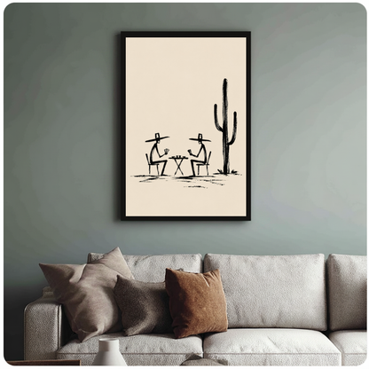 Framed cowboys playing cards canvas above a neutral sofa with cushions against a muted wall.
