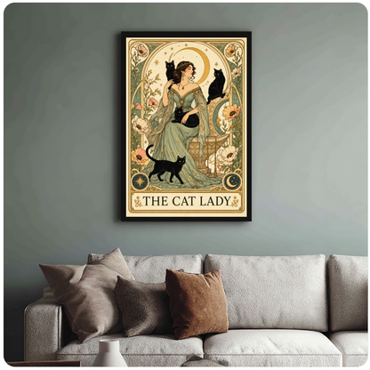 Framed the cat lady moon portrait canvas above a neutral sofa with cushions against a muted wall.