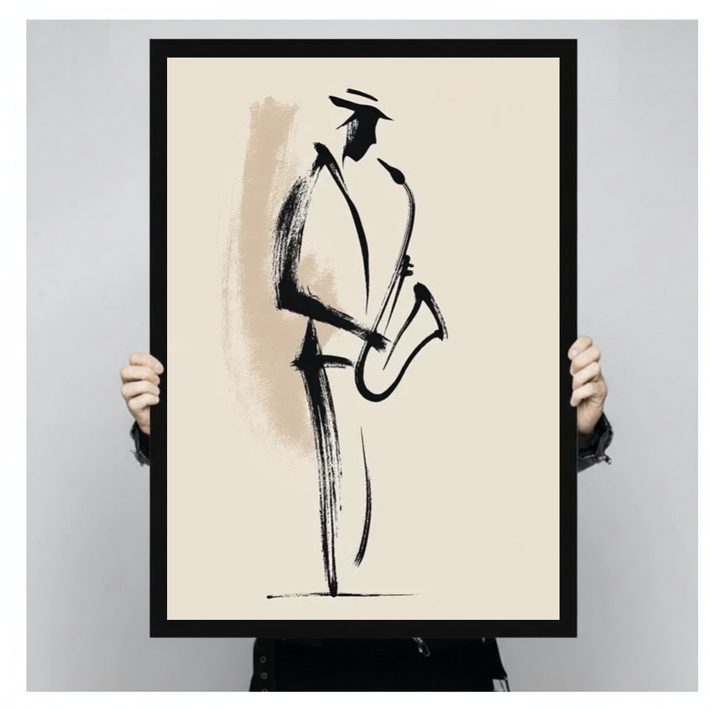 A person holds black framed minimal saxophone player canvas against a light neutral background.