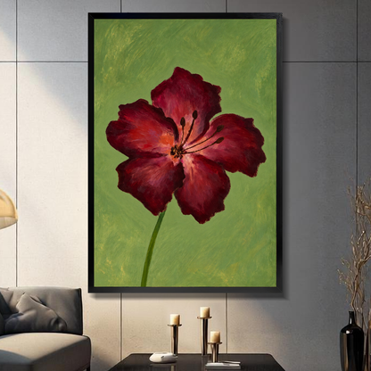 Black framed burgundy bloom on olive canvas displayed above a console in the selected room setting.