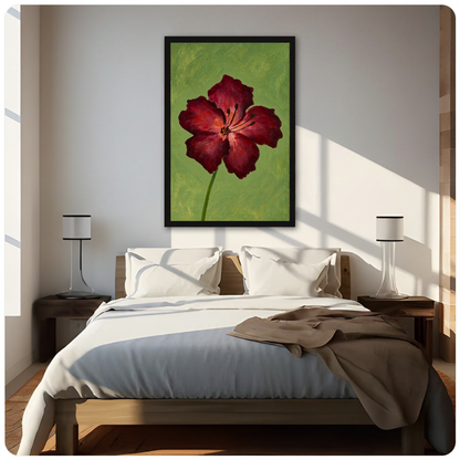 Framed burgundy bloom on olive canvas above a neutral bed beside soft bedroom lighting and lamps.