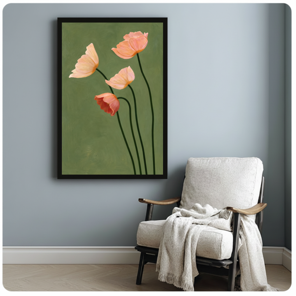 Framed four blush poppies canvas beside a pale reading chair on a blue gray wall.