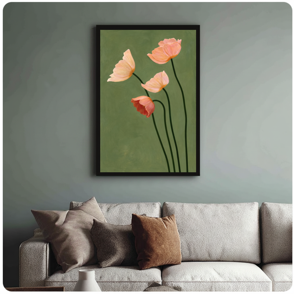 Framed four blush poppies canvas above a neutral sofa with cushions against a muted wall.