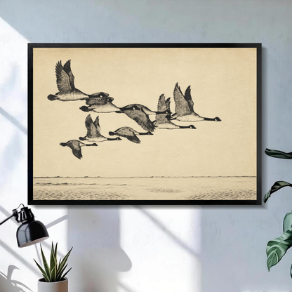 Black framed flying geese over quiet water canvas above a console in the selected room setting.
