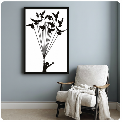 Framed birds lift a dream canvas beside a pale reading chair on a blue gray wall.