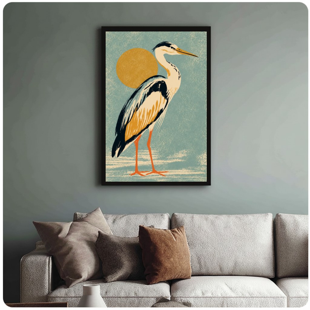 Framed golden sun heron canvas above a neutral sofa with cushions against a muted wall.