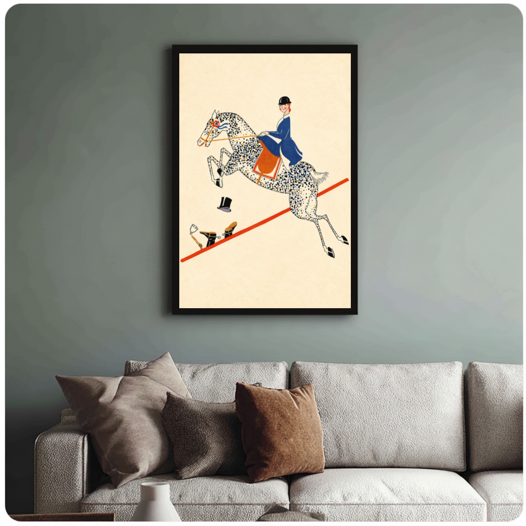 Framed vintage equestrian balancing act canvas above a neutral sofa with cushions against a muted wall.
