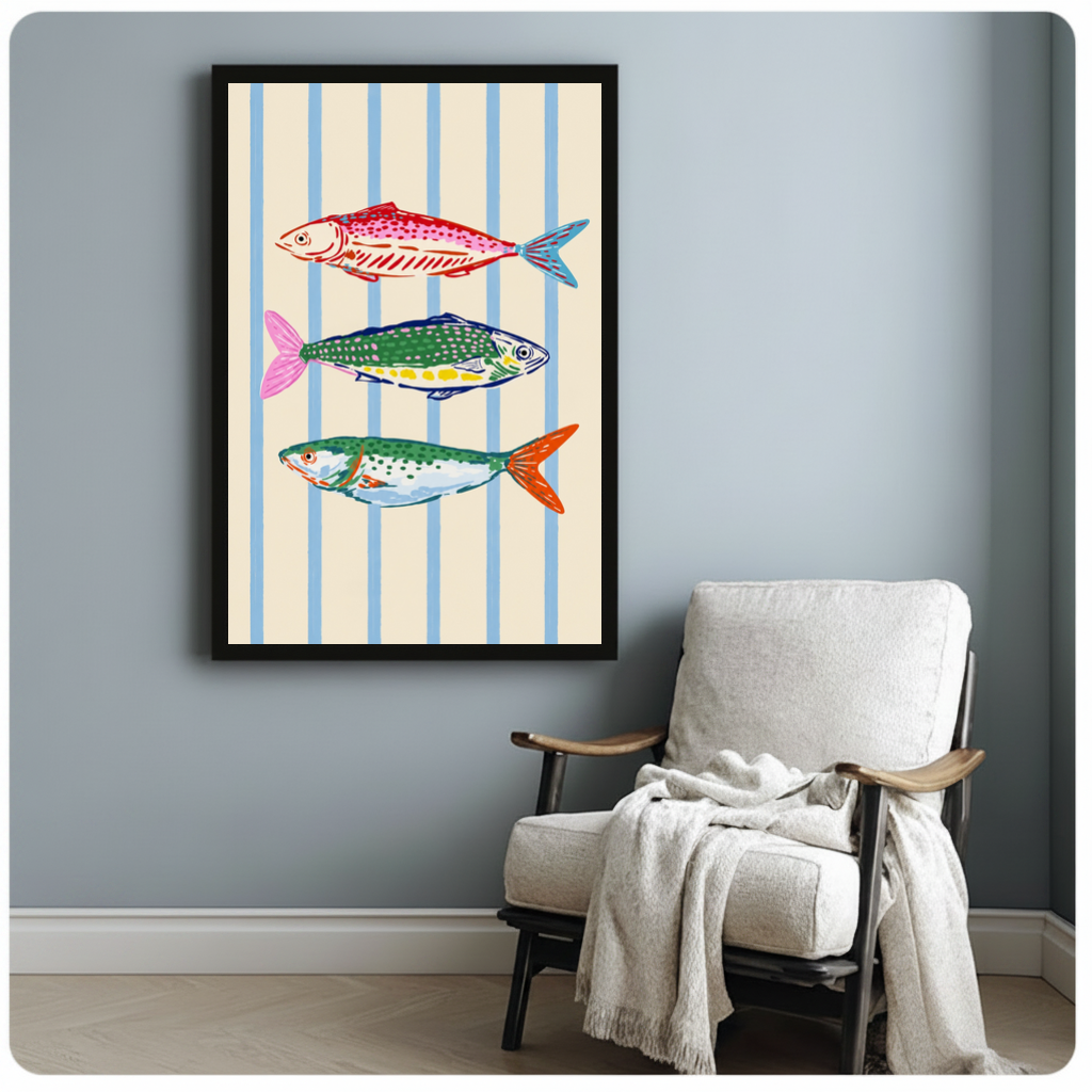 Framed colorful fish blue stripes canvas beside a pale reading chair on a blue gray wall.
