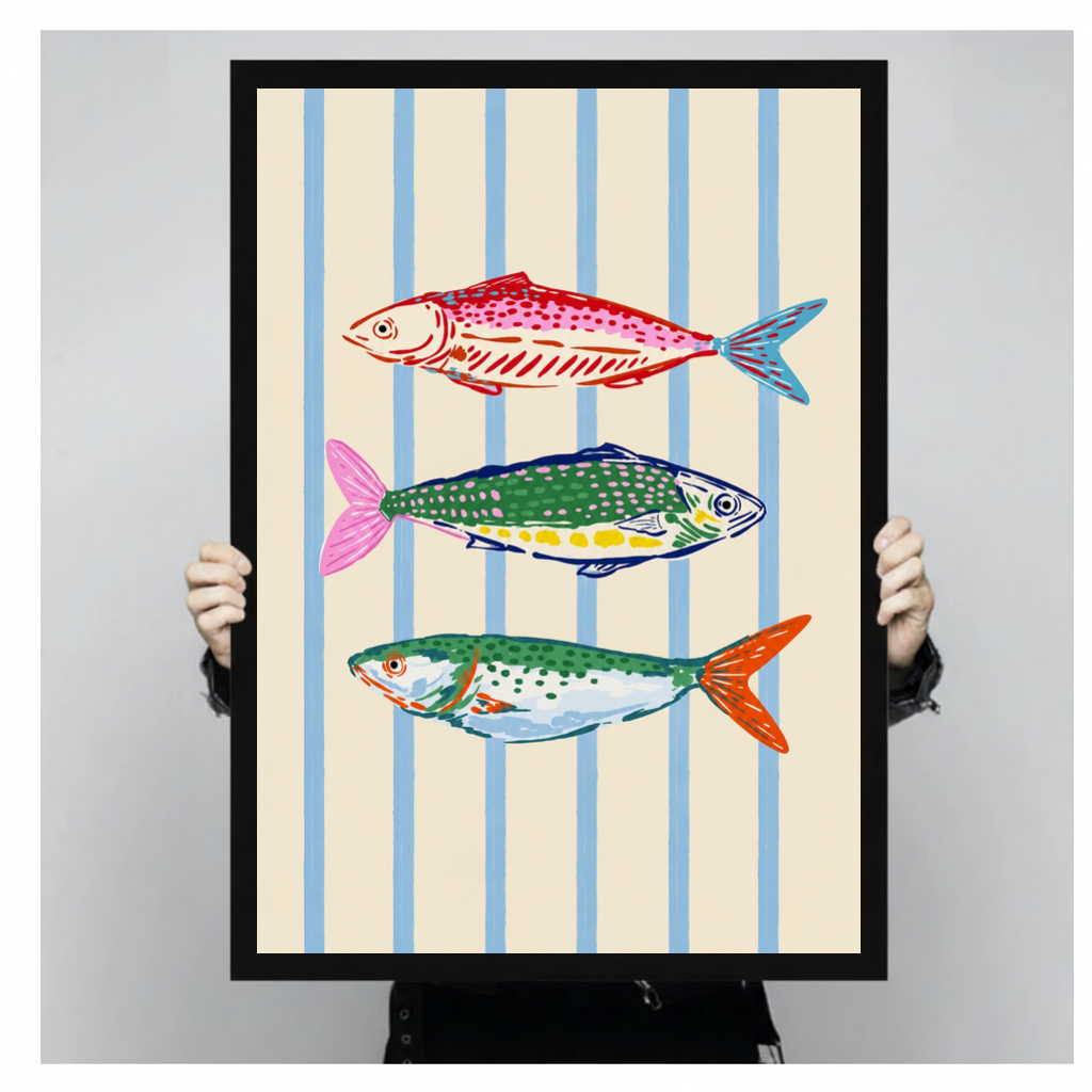 Framed colorful fish blue stripes canvas held by a person against a light neutral background.