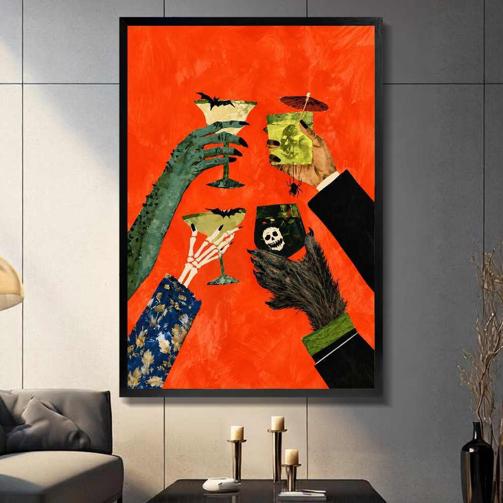 Black framed monster hands cocktail toast canvas on a dark paneled wall beside warm candles.