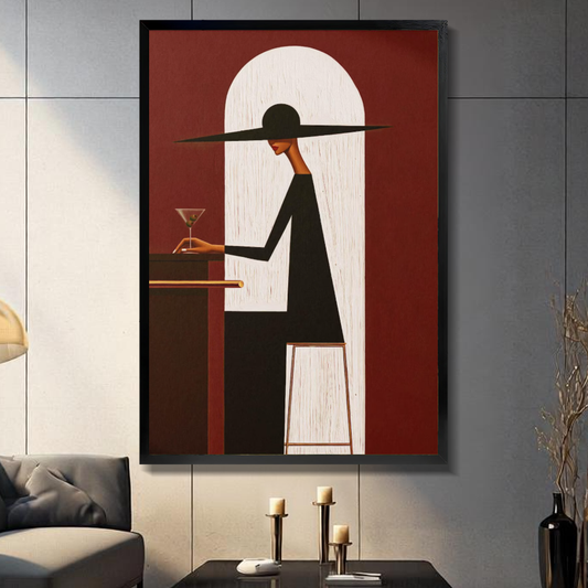 Black framed wide hat martini woman canvas on a dark paneled wall beside warm candles.