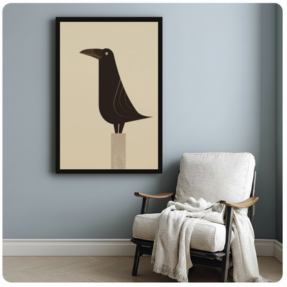 Framed minimal raven on pedestal canvas beside a pale reading chair on a blue gray wall.