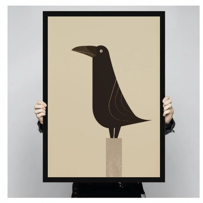 Framed minimal raven on pedestal canvas held by a person against a light neutral background.