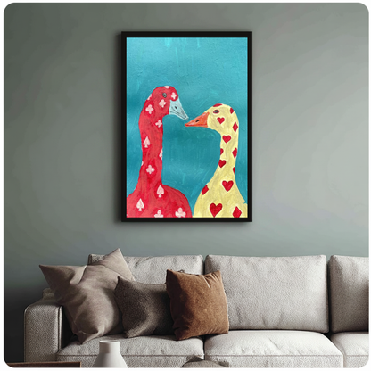 Framed playing card geese canvas above a neutral sofa with cushions against a muted wall.